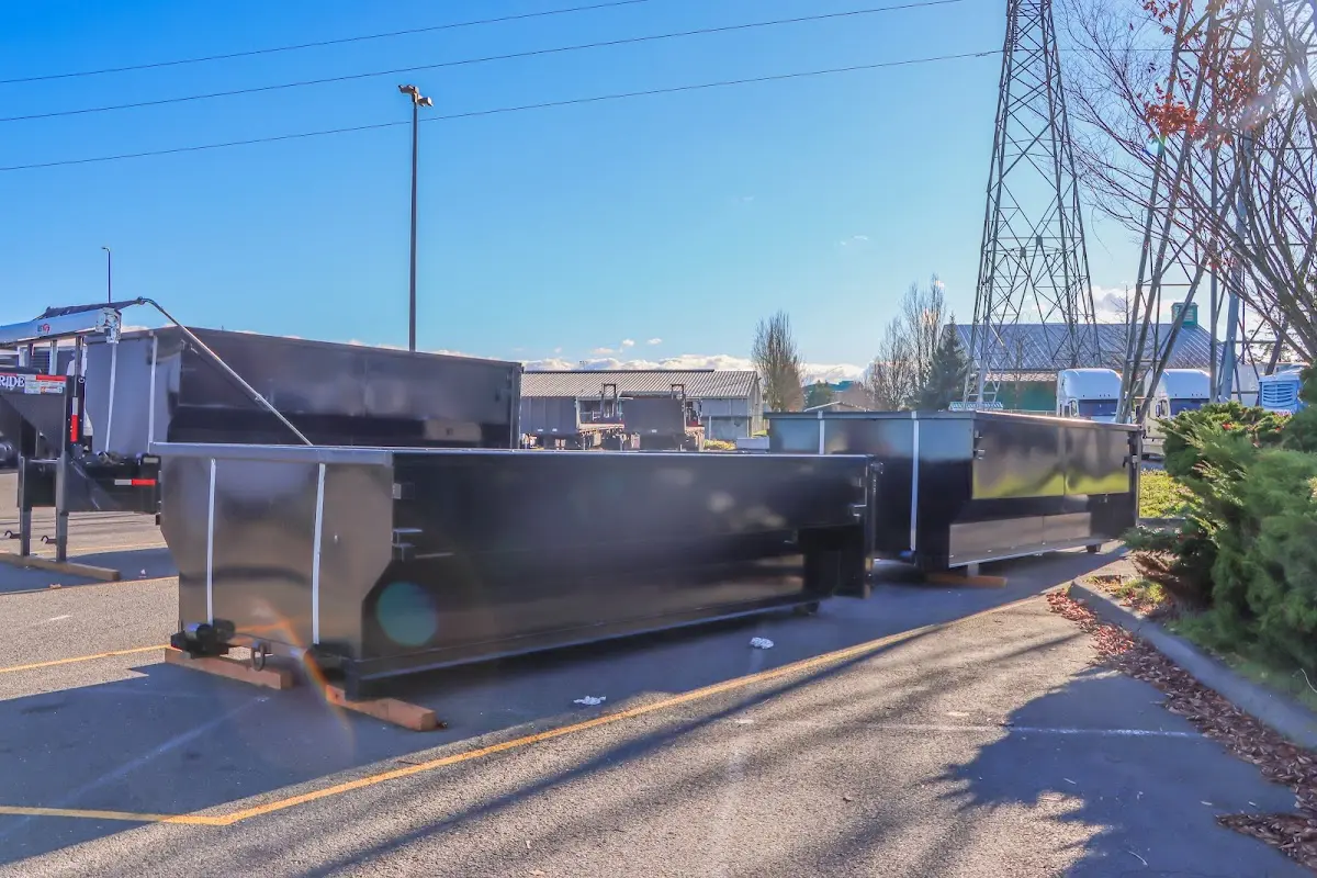 Roll-off dumpster ready for waste disposal at job site for Roofing Dumpster Rental in Ponca City